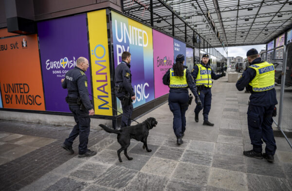 Police use sniffer dogs to secure the area at the Malmo Arena, the venue of the Eurovision song contest (ESC) in Malmo, Sweden on April 26, 2024. (Photo by Johan NILSSON / TT News Agency / AFP) / Sweden OUT