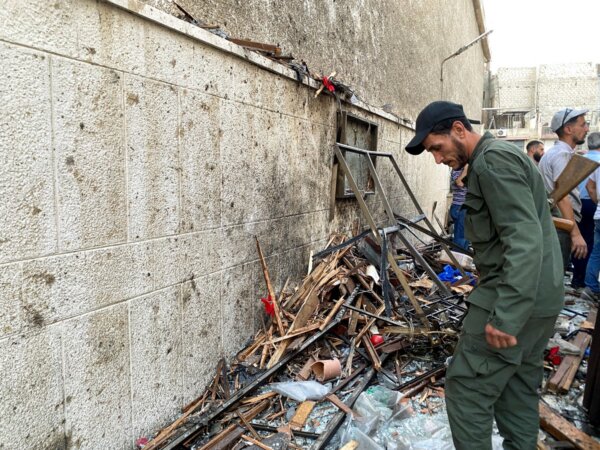 A member of the Syrian security force inspects the damage after a blast rocked the Mar Elias Church according to witnesses, in the Dweila neighbourhood of Damascus, Syria June 22, 2025. REUTERS/Firas Makdesi