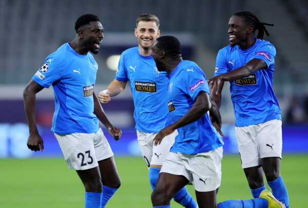 epa12505872 Derrick Luckassen (L) of Pafos celebrates with teammates after scoring the opening goal during the UEFA Champions League league phase match beween Pafos and Villarreal CF, in Limassol, Cyprus, 05 November 2025. EPA/SAKIS SAVVIDES